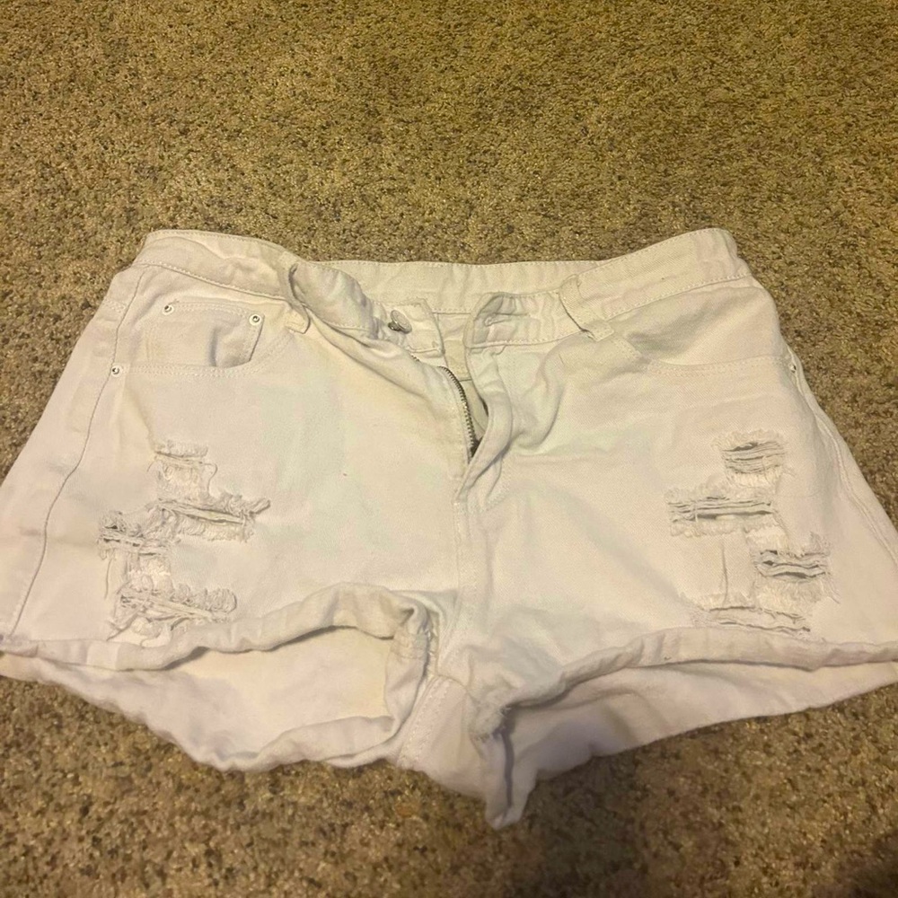 White distressed jean shorts